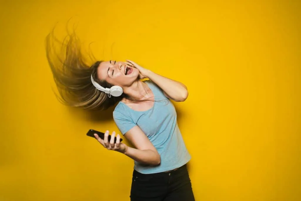 Girl rocking to music