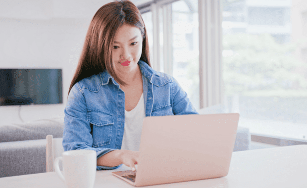 Woman typing from home